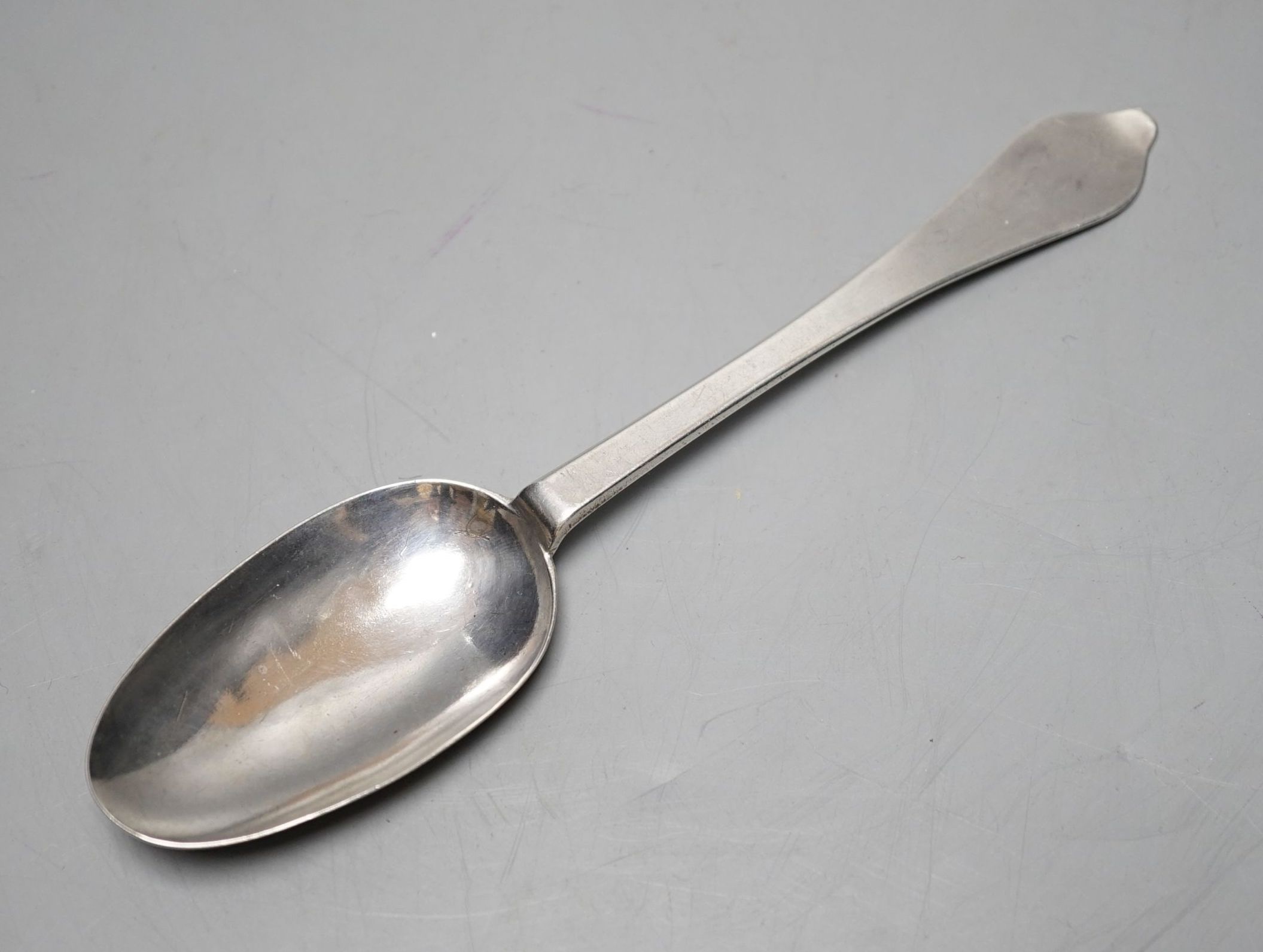 An early 18th century silver dog nose spoon, with prick dot engraved initial and date, marks rubbed, 19cm, 46 grams.